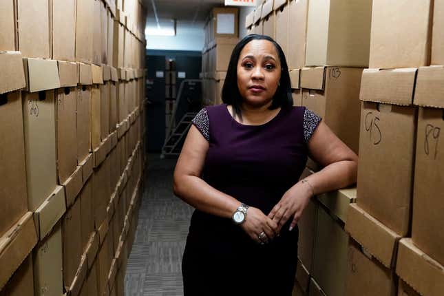 Fulton County District Attorney Fani Willis poses for a photo at her office, Feb. 24, 2021 in Atlanta. The Georgia prosecutor who’s investigating possible attempts to interfere in the 2020 general election by former President Donald Trump and others has asked for a special grand jury to aid the investigation. Willis, on Thursday, Jan. 20, 2022, sent a letter to Fulton County Superior Court Chief Judge Christopher Brasher asking him to impanel a special grand jury.