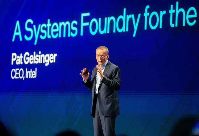 Pat Gelsinger speaking on a stage with a navy backdrop that says A Systems Foundry for the and his title