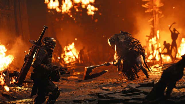 Survivors take on an abomination while surrounded by fire. 