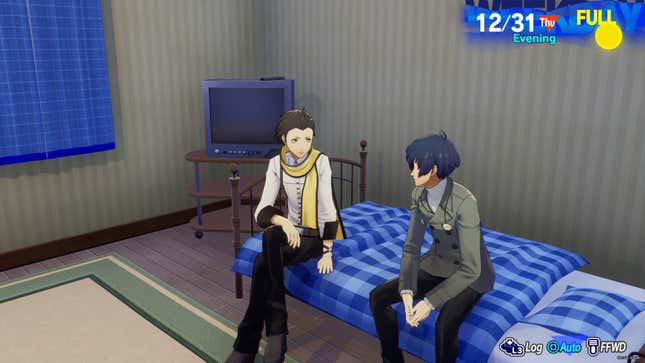 Makoto and Ryoji sit on a bed.