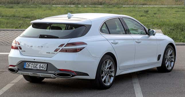 A white Genisis G70 Shooting Brake