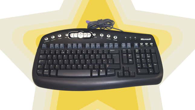 A Microsoft MultiMedia 1.0A keyboard, deservedly on a background of stars.