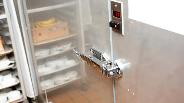 walk in cooler refrigerator at restaurant kitchen