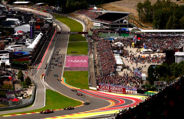 Charles Leclerc of Monaco driving the (16) Ferrari SF-23 leads Sergio Perez of Mexico driving the (11) Oracle Red Bull Racing RB19 and the rest of the field at the start during the F1 Grand Prix of Belgium at Circuit de Spa-Francorchamps on July 30, 2023 in Spa, Belgium