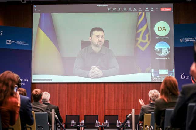 Ukrainian President Volodymyr Zelenskyy speaks during a live broadcast at the 6th German-Ukrainian Business Forum of the DIHK, the Committee on Eastern European Economic Relations and the German-Ukrainian Chamber of Industry and Commerce (AHK Ukraine), in Berlin, Tuesday, Oct. 24, 2023. Topics include infrastructure, energy and defense as well as investment conditions for German companies in Ukraine. (Kay Nietfeld/dpa via AP)