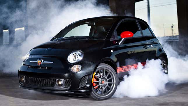 A photo of a black Fiat 500 Abarth. 