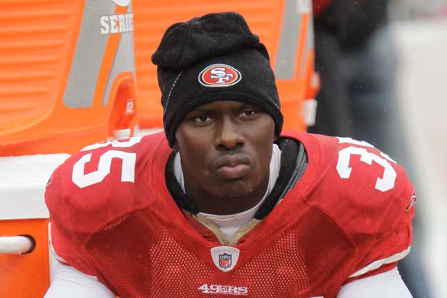 San Francisco 49ers cornerback Phillip Adams sits on the sideline during the first quarter of an NFL football game in San Francisco.