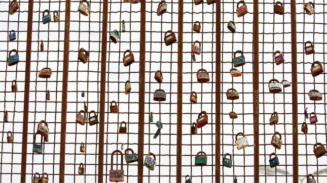 Locks on a metal fence