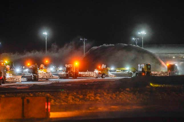 Plow crews in action at Oslo Airport Gardermoen in Gardermoen, Norway, Wednesday, Jan. 17, 2024. (Cornelius Poppe/NTB via AP)