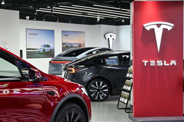 Tesla cars are seen at a showroom for the US electric vehicle maker at a mall in the Changning district of Shanghai on February 25, 2025. 