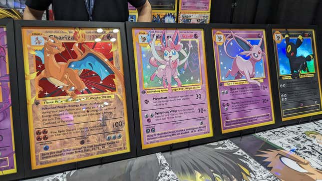 Large Pokemon cards are on display at Comic Con.