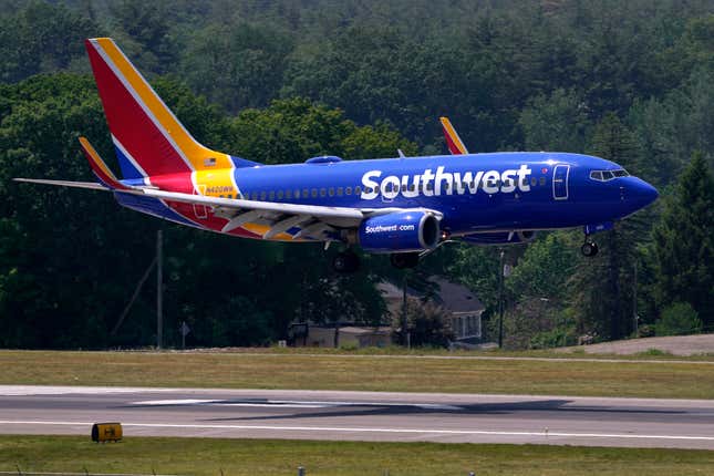 FILE - Southwest Airlines Boeing 737 lands at Manchester Boston Regional Airport, June 2, 2023, in Manchester, N.H. Southwest Airlines reports their earnings on Thursday, Jan. 25, 2024. (AP Photo/Charles Krupa, File)