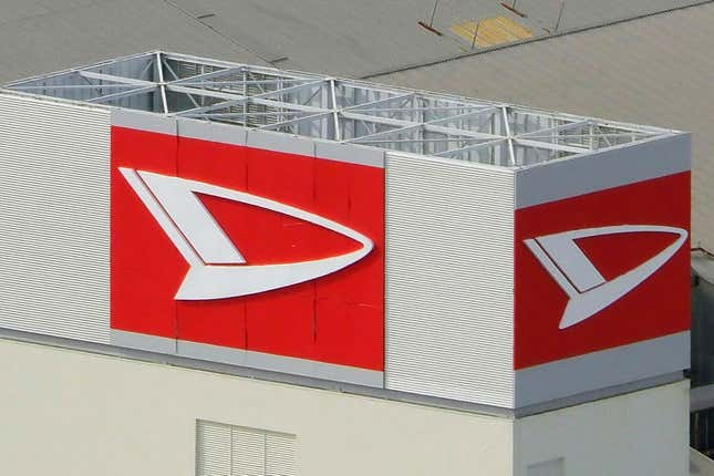 FILE - This aerial photo shows the logo of Daihatsu Motor Co. at its headquarters in Ikeda, north of Osaka, Japan, on Dec. 20, 2023. The Japanese automaker that cheated on safety tests for decades said Monday, Jan. 22, 2024, it doesn&#39;t expect to resume shipping cars any time soon. The Japanese government ordered Daihatsu, a subsidiary of Toyota, to halt production of its entire lineup after reports of faked safety test results emerged last year. (Kyodo News via AP, File)