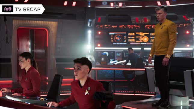Pike stands in fronr of the Enterprise captain's chair as La'an and Ortegas pilot the ship.