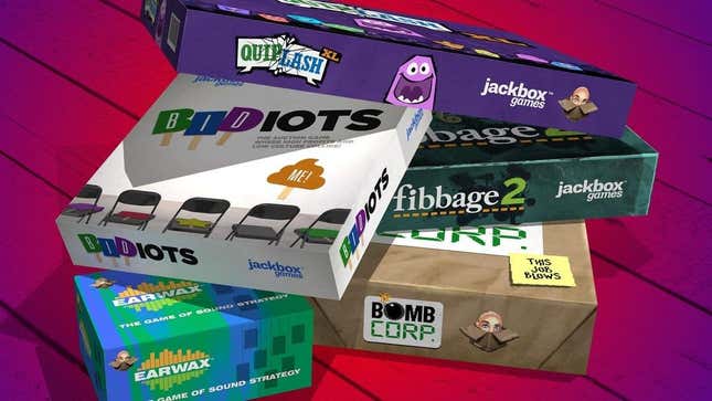 A pile of board game boxes stacked on top of each other