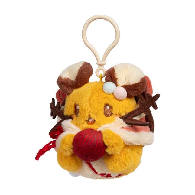 Dedenne sosteniendo una bola de hilo rojo.