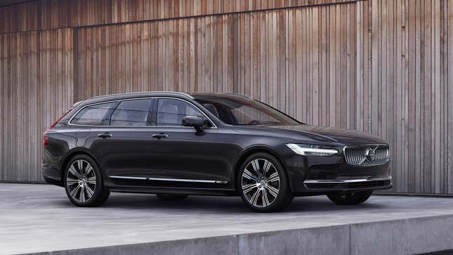 A photo of a black Volvo V90 station wagon. 