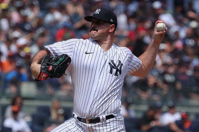 Aug 6, 2023; Bronx, New York, USA; New York Yankees starting pitcher Carlos Rodon (55) delivers a pitch during the first inning against the Houston Astros at Yankee Stadium.