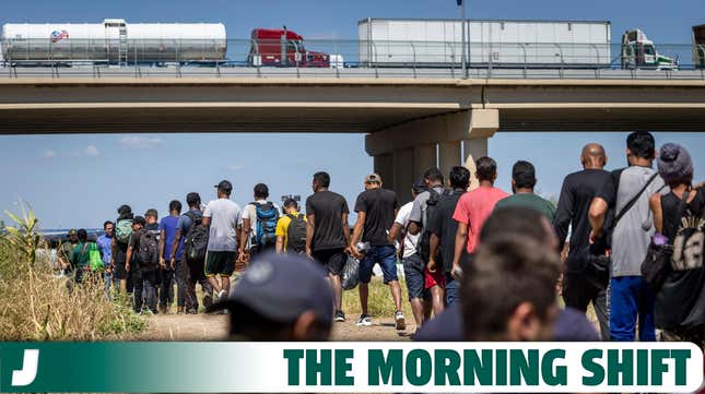 Immigrants walk towards a U.S. Border Patrol checkpoint after crossing the U.S.-Mexico border on September 28, 2023 in Eagle Pass, Texas.