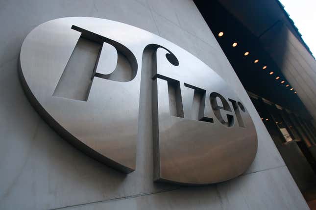  A Pfizer sign hangs on the outside of their headquarters 