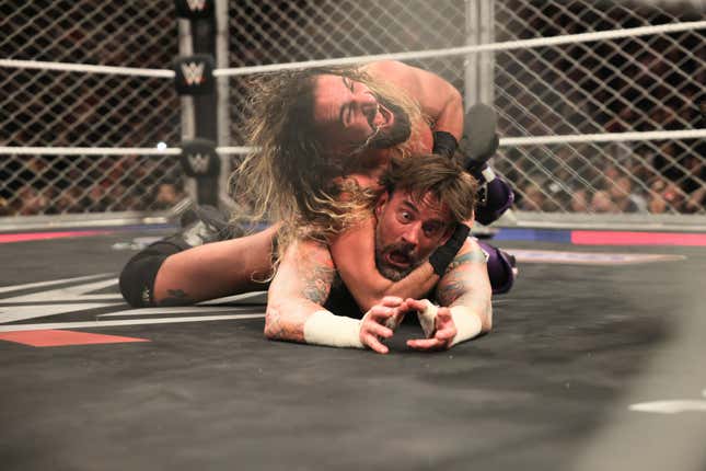 CM Punk struggling against Seth Rollins