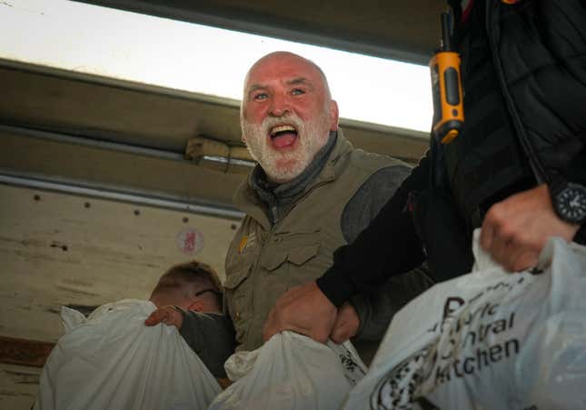 FILE - Jose Andres, a Spanish chef, and founder of World Central Kitchen unloads the humanitarian food packages delivered with WCK&#39;s truck in Kherson, Ukraine, on Nov. 15, 2022. World Central Kitchen, called a halt to its work in the Gaza Strip after an apparent Israeli strike killed seven of its workers, mostly foreigners. (AP Photo/Efrem Lukatsky, File)