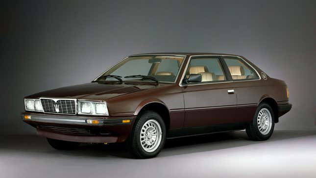 A photo of a burgundy Maserati Biturbo. 