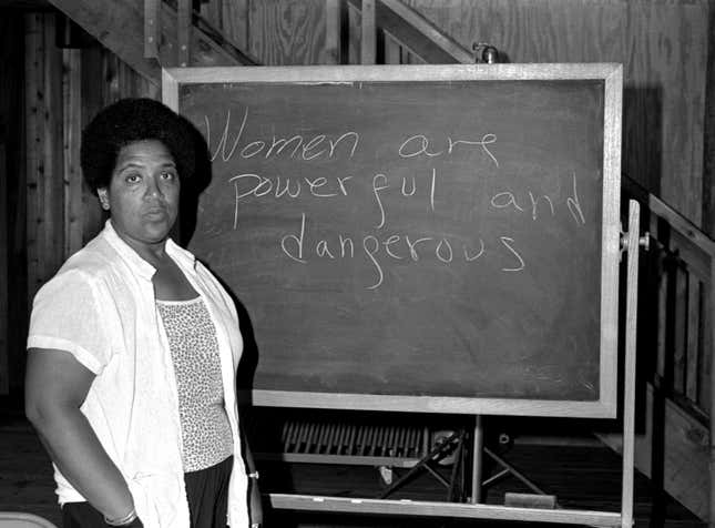 Audre Lorde (1934-1992) poses for a photograph during her 1983 residency at the Atlantic Center for the Arts in New Smyrna Beach, Florida.