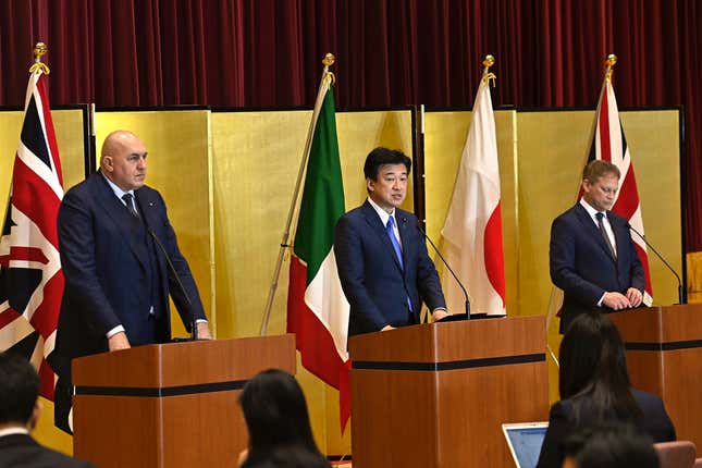 FILE - Britain&#39;s Defense Minister Grant Shapps, right, Italy&#39;s Defense Minister Guido Crosetto, left, and Japanese Defense Minister Minoru Kihara, center, attend a joint press conference after a signing ceremony for Global Combat Air Programme (GCAP) at the defense ministry on Dec. 14, 2023, in Tokyo, Japan. Japan’s Cabinet on Tuesday, March 26, 2024, approved a plan to sell future next-generation fighter jets that it’s developing with Britain and Italy to other countries, in the latest move away from the country’s postwar pacifist principles. (David Mareuil/Pool Photo via AP, File)