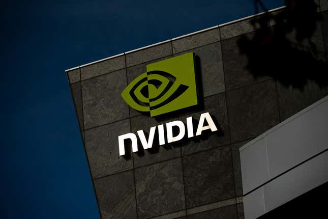 Nvidia logo on the corner of a grey building against a blue sky