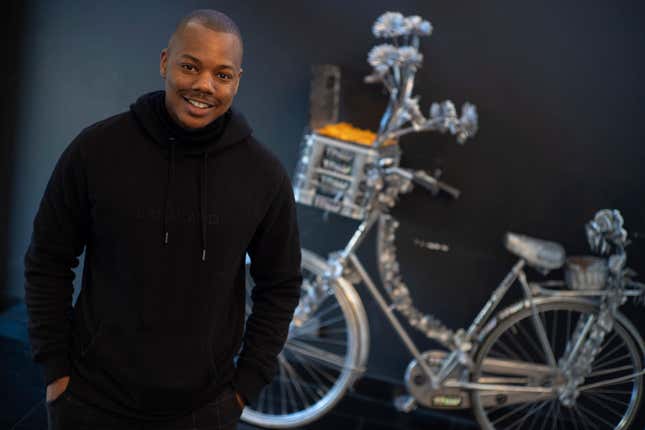 Michael Musandu, a co-founder and CEO of AI fashion company Lalaland.ai, poses for a portrait in Amsterdam, Netherlands, Friday, March 8, 2024. In March 2023, iconic denim brand Levi Strauss &amp; Co. announced that it would be testing AI-generated models produced by the Amsterdam-based company to add a wider range of body types and underrepresented demographics on its website. (AP Photo/Peter Dejong)