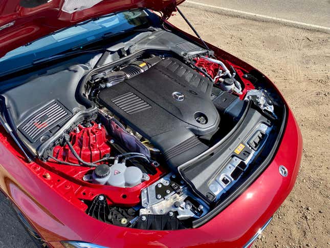 An under-hood shot of the CLE Cabriolet showing its magnificent I6