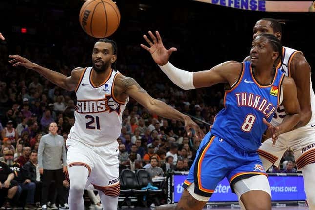 Nov 12, 2023; Phoenix, Arizona, USA; Oklahoma City Thunder forward Jalen Williams (8) gets the inbound ball against Phoenix Suns forward Keita Bates-Diop (21) and forward Kevin Durant (35) during the second quarter at Footprint Center.