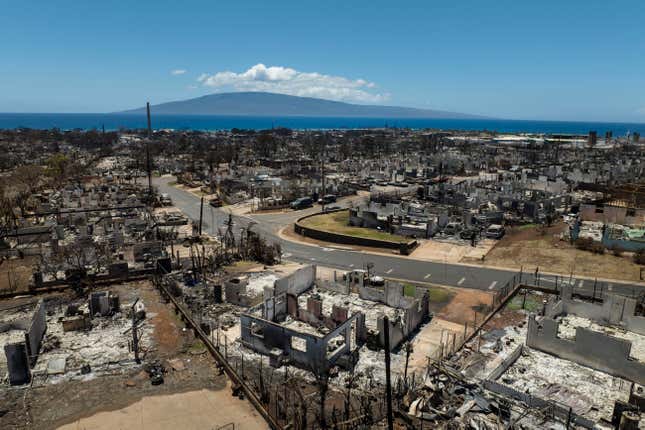 FILE - The aftermath of a devastating wildfire is seen, Aug. 22, 2023, in Lahaina, Hawaii. Americans nationwide face hefty increases in their homeowner’s insurance premiums in the coming years, a report by the First Street Foundation said on Wednesday, Sept. 20, as climate change intensifies floods, wildfires and storms in ways insurance companies are simply unable to keep up with. (AP Photo/Jae C. Hong, File)