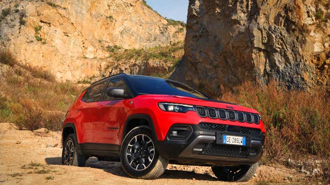 A photo of a red Jeep Compass SUV. 