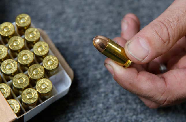 FILE - Chris Puehse, owner of Foothill Ammo, displays .45-caliber ammunition for sale at his store in Shingle Springs, Calif., on June 11, 2019. A federal judge on Tuesday, Jan. 30, 2024, struck down a California law requiring people pay for a background check every time they purchase ammunition. (AP Photo/Rich Pedroncelli, File)