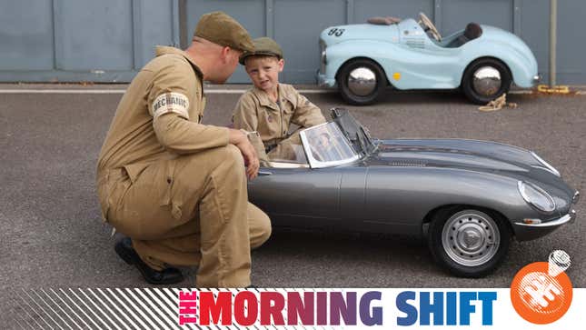 7-year-old Hugo Upward and his father show off their miniature Jaguar E-type at Goodwood. It is all-electric and can hit 35 mph.