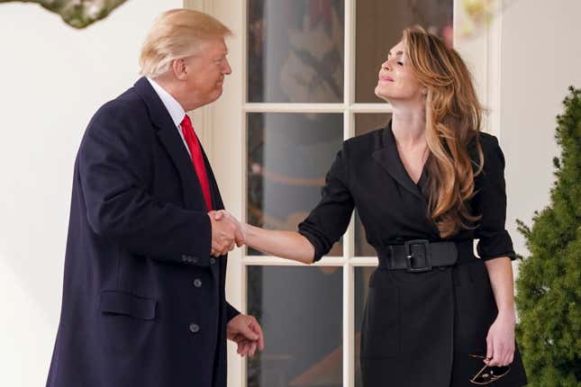 President Donald Trump shakes hands with outgoing White House Communications Director Hope Hicks on her last day.