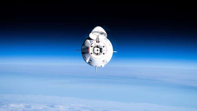 The SpaceX Dragon Freedom spacecraft  approaching the International Space Station 