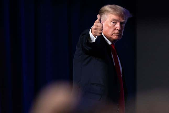 Former U.S. President Donald Trump give a thumbs up as he walks off after speaking at the Conservative Political Action Conference (CPAC) in Dallas, Texas on July 11, 2021.