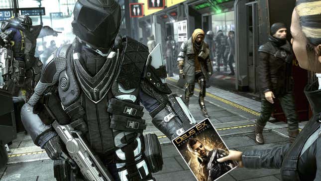A person on the right hands a suitably dressed soldier in the middle a copy of Deus Ex: Mankind Divided.