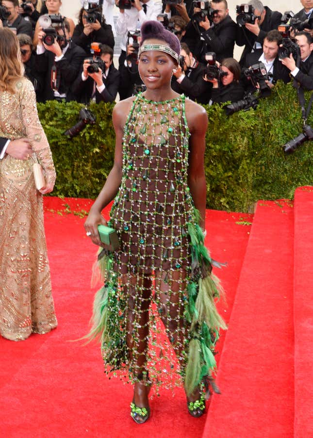  Lupita Nyong’o attends the “Charles James: Beyond Fashion” Costume Institute Gala at the Metropolitan Museum of Art on May 5, 2014 in New York City.
