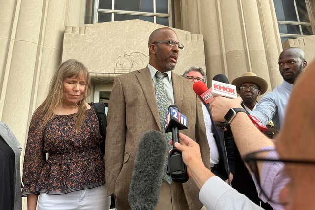 Christopher Dunn emerges from a St. Louis courtroom with his wife, Kira, on July 30, 2024, after being freed following 34 years in prison. A judge overturned Dunn’s conviction on July 22