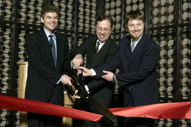 Executives cut the ceremonial red ribbon marking the grand opening of the newest LeMeridien luxury hotel June 6, 2003 in Minneapolis, Minnesota.