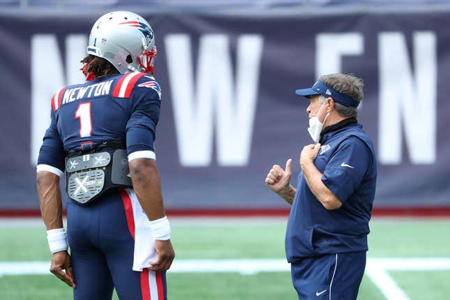 Cam Newton #1 of the New England Patriots talks with head coach Bill Belichick before the game against the Miami Dolphins at Gillette Stadium on September 13, 2020 in Foxborough, Massachusetts.