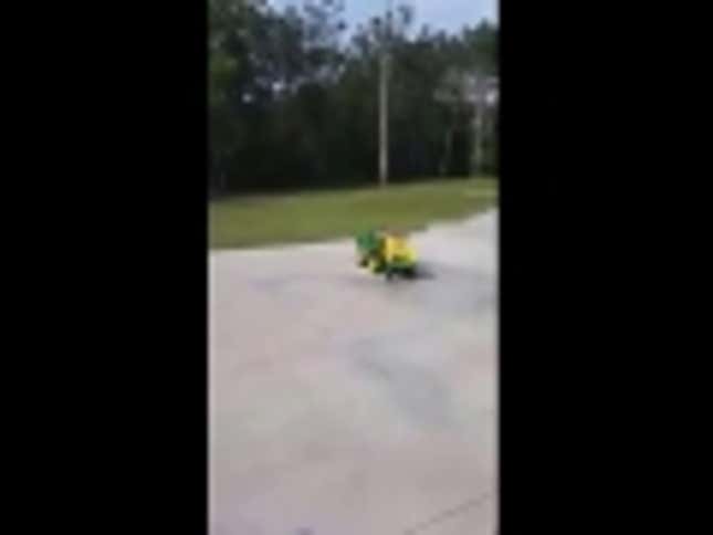 Kid Falls Asleep At The Wheel Of His Tiny Tractor; Tractor Keeps Going