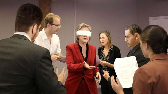 Image for article titled Blindfolded Clinton Invites Debate Coaches To Attack Her With Talking Points From All Sides