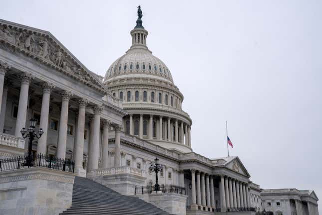 An American Flag flies at half staff at the U.S. Capitol on January 11, 2021 in Washington, DC. President Donald Trump ordered American flags to fly at half staff to honor two U.S. Capitol Police officers who died following the violence on Capitol Hill last Wednesday. 