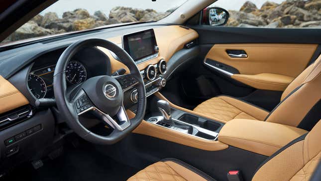 And now the 2021 Sentra’s cabin. The diamond-patterned seats, the circular climate vents, the thinner wheel, the colors. That’s more like it!