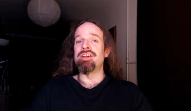 Accursed Farms talks into the camera.